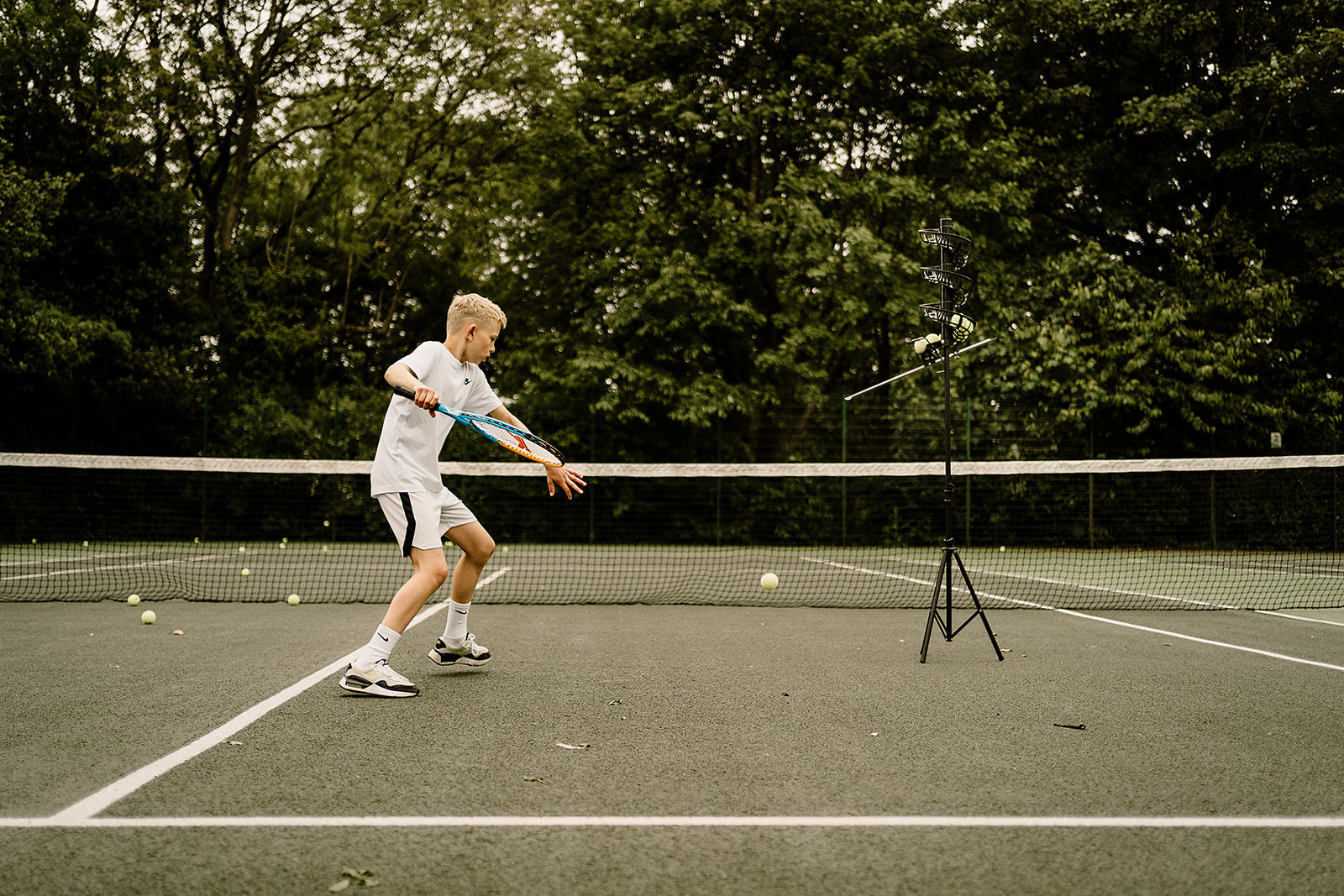 Load video: Tennis ball machine